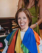 Load image into Gallery viewer, Client during a House of Colour DeKalb color analysis session at House of 423, draped in color-matching fabrics to discover her personal palette
